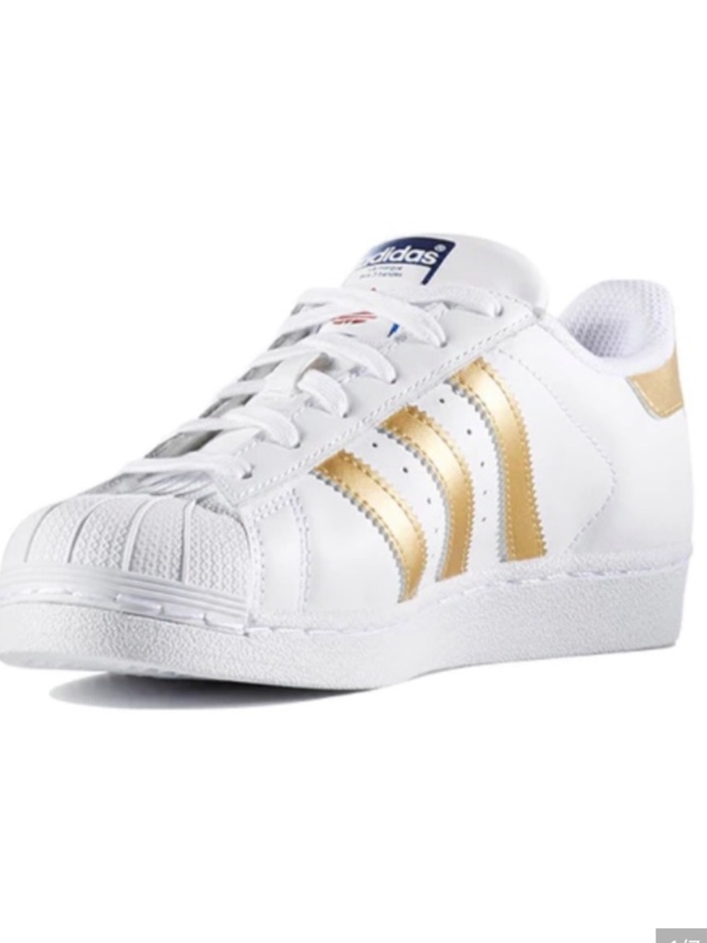 adidas Women’s White Sneakers with Gold Three-Stripes
